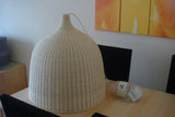 handwoven-natural-rattan-globe-pendant-lamp-for-coastal-and-bohemian-living-spaces