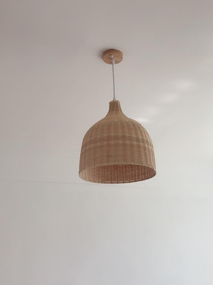 handwoven-natural-rattan-globe-pendant-lamp-for-coastal-and-bohemian-living-spaces