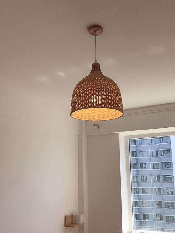 handwoven-natural-rattan-globe-pendant-lamp-for-coastal-and-bohemian-living-spaces