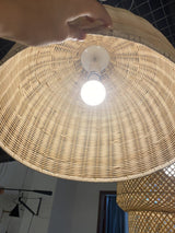 handwoven-natural-rattan-globe-pendant-lamp-for-coastal-and-bohemian-living-spaces