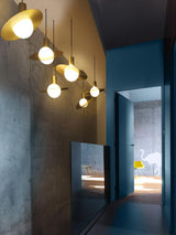 saturn-modern-celestial-sphere-pendant-light-with-swiveling-brass-ring-and-opal-glass-shade