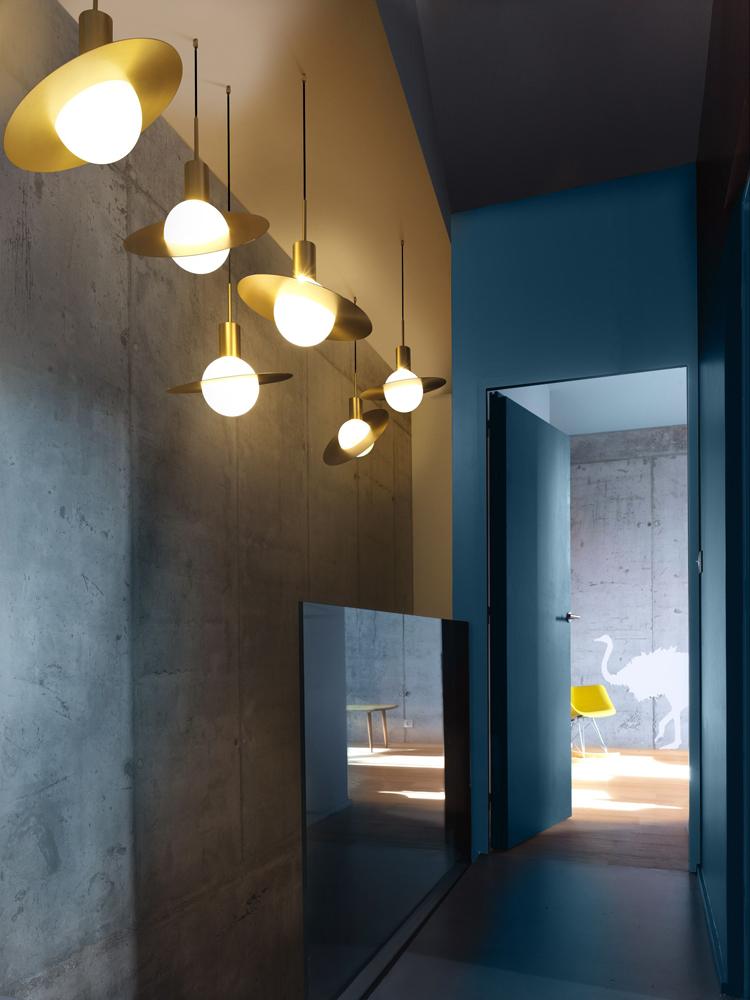 saturn-modern-celestial-sphere-pendant-light-with-swiveling-brass-ring-and-opal-glass-shade