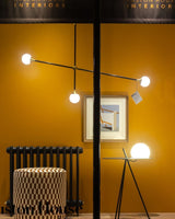 modern-hand-blown-glass-globe-chandelier-with-elegant-brass-and-copper-finishes