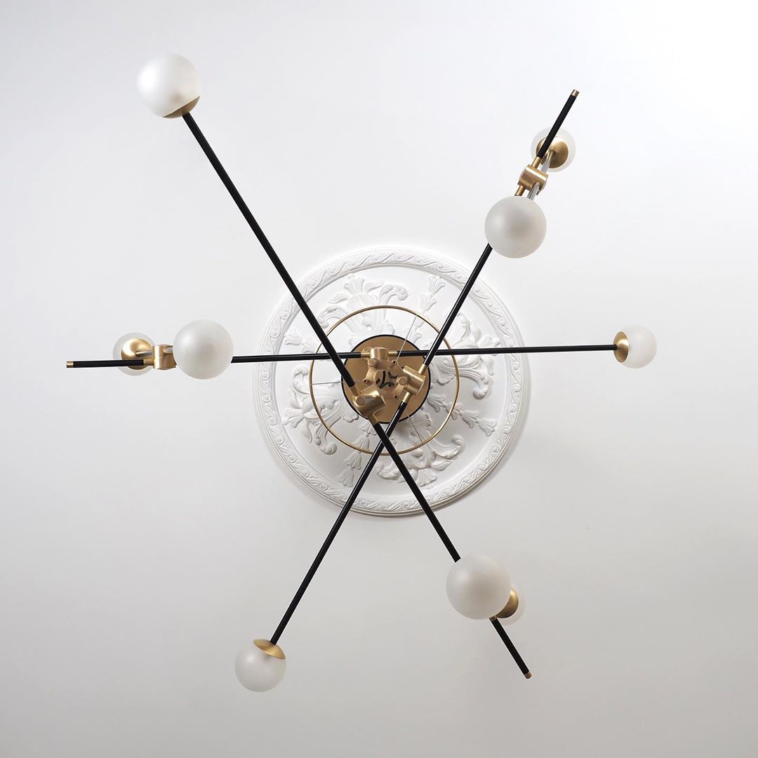 modern-hand-blown-glass-globe-chandelier-with-elegant-brass-and-copper-finishes