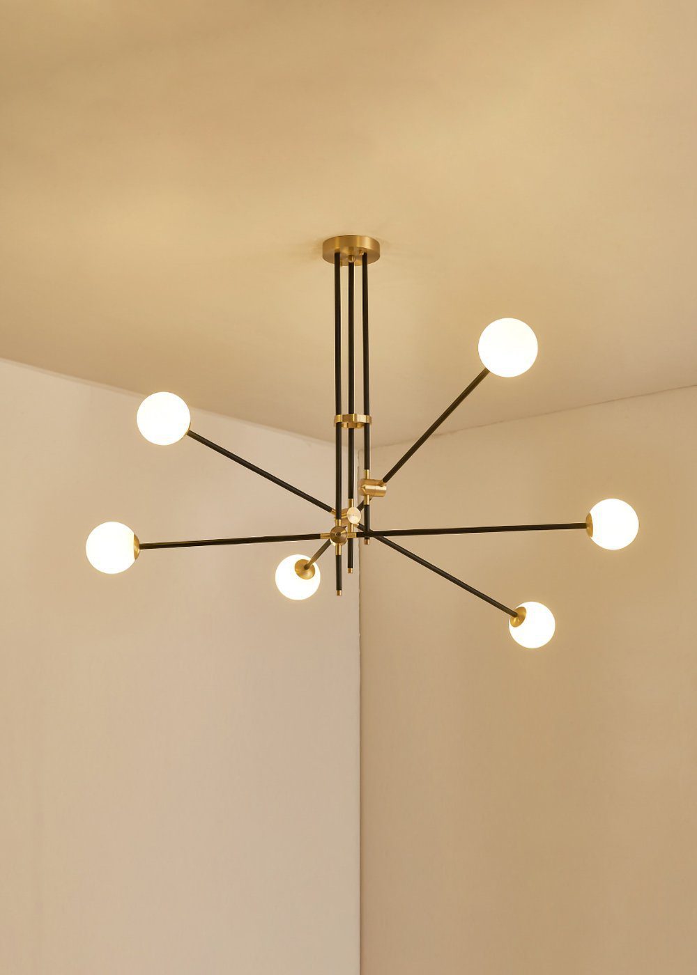modern-hand-blown-glass-globe-chandelier-with-elegant-brass-and-copper-finishes