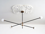modern-hand-blown-glass-globe-chandelier-with-elegant-brass-and-copper-finishes