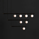 modern-geometric-satellite-pendant-light-with-opal-glass-globes-and-adjustable-brass-arms