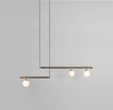 modern-geometric-satellite-pendant-light-with-opal-glass-globes-and-adjustable-brass-arms