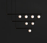 modern-geometric-satellite-pendant-light-with-opal-glass-globes-and-adjustable-brass-arms