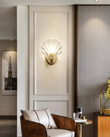 elegant-shell-shaped-brass-and-amber-glass-wall-lamp-for-modern-home-decor
