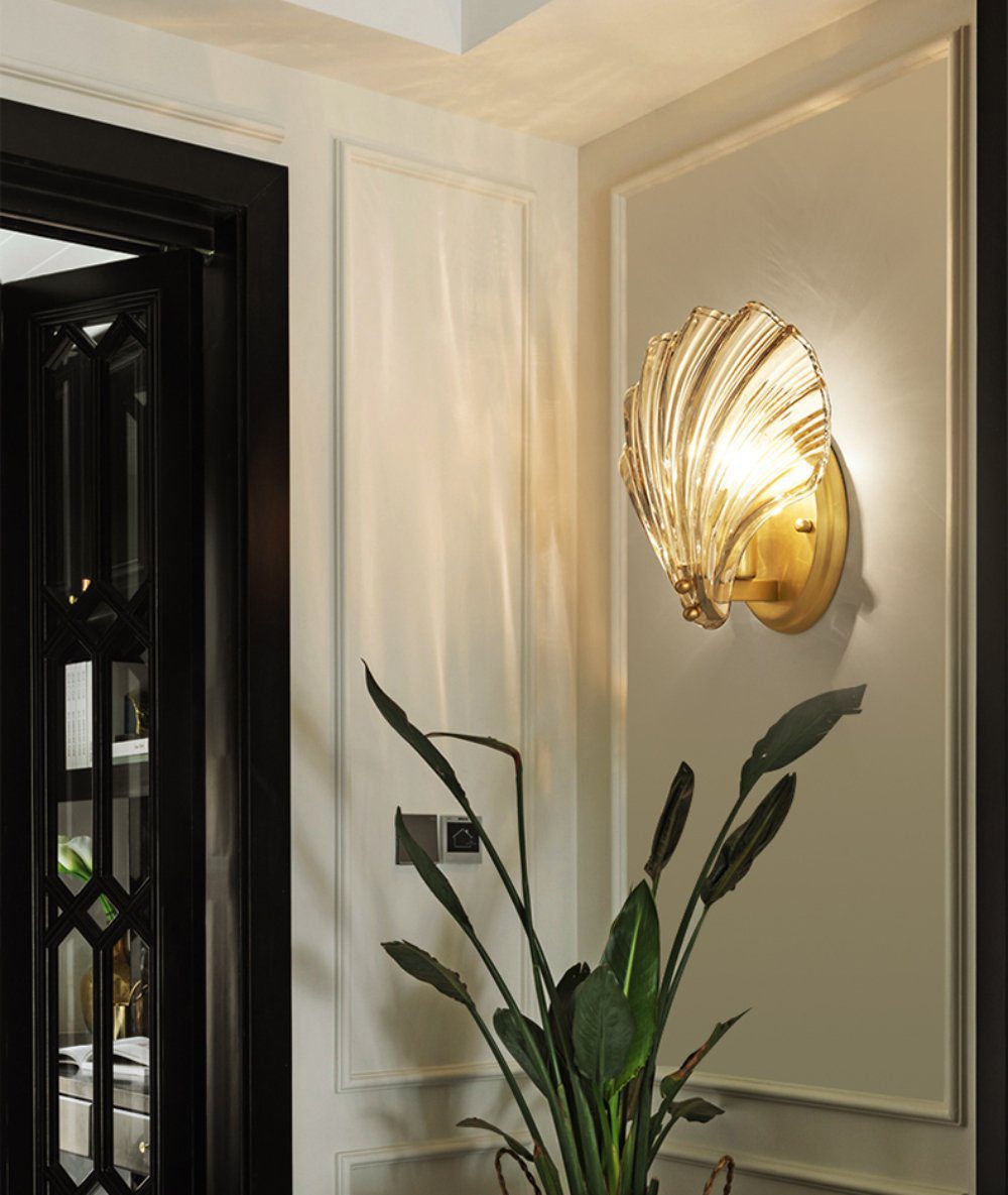 elegant-shell-shaped-brass-and-amber-glass-wall-lamp-for-modern-home-decor