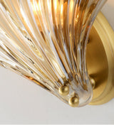 elegant-shell-shaped-brass-and-amber-glass-wall-lamp-for-modern-home-decor