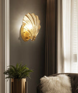 elegant-shell-shaped-brass-and-amber-glass-wall-lamp-for-modern-home-decor