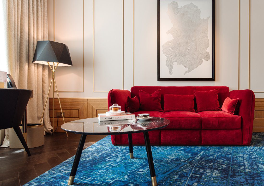 modern-solitaire-tripod-floor-lamp-with-black-polygonal-cloth-shade-and-brass-accents