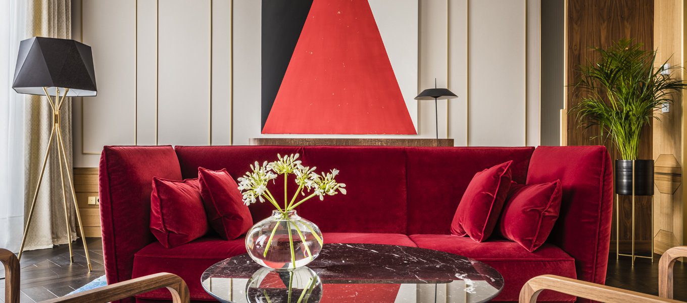 modern-solitaire-tripod-floor-lamp-with-black-polygonal-cloth-shade-and-brass-accents