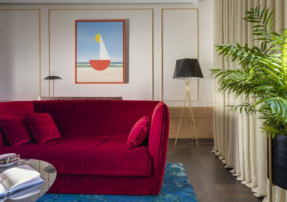 modern-solitaire-tripod-floor-lamp-with-black-polygonal-cloth-shade-and-brass-accents