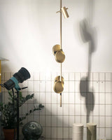 typography-cilon-disc-minimalist-led-pendant-lamp-sculptural-vertical-lighting-for-modern-living-space