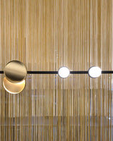 typography-cilon-disc-minimalist-led-pendant-lamp-sculptural-vertical-lighting-for-modern-living-space