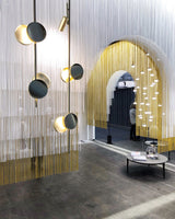 typography-cilon-disc-minimalist-led-pendant-lamp-sculptural-vertical-lighting-for-modern-living-space