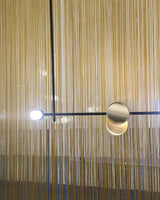 typography-cilon-disc-minimalist-led-pendant-lamp-sculptural-vertical-lighting-for-modern-living-space