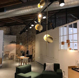 typography-cilon-disc-minimalist-led-pendant-lamp-sculptural-vertical-lighting-for-modern-living-space