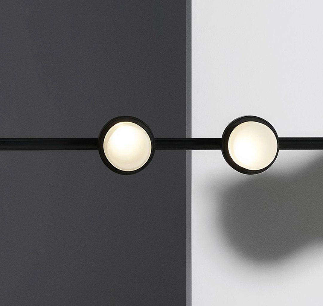 typography-cilon-disc-minimalist-led-pendant-lamp-sculptural-vertical-lighting-for-modern-living-space