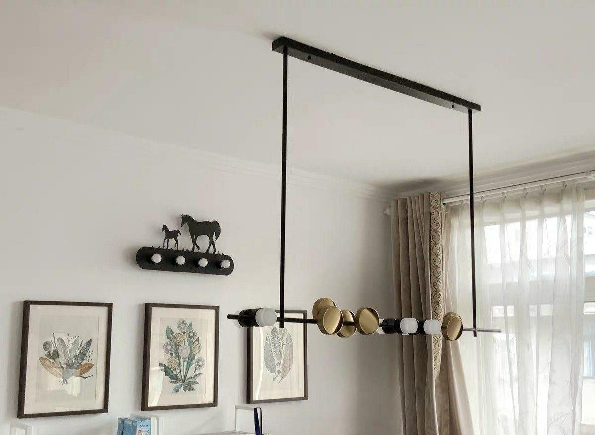 typography-cilon-disc-minimalist-led-pendant-lamp-sculptural-vertical-lighting-for-modern-living-space