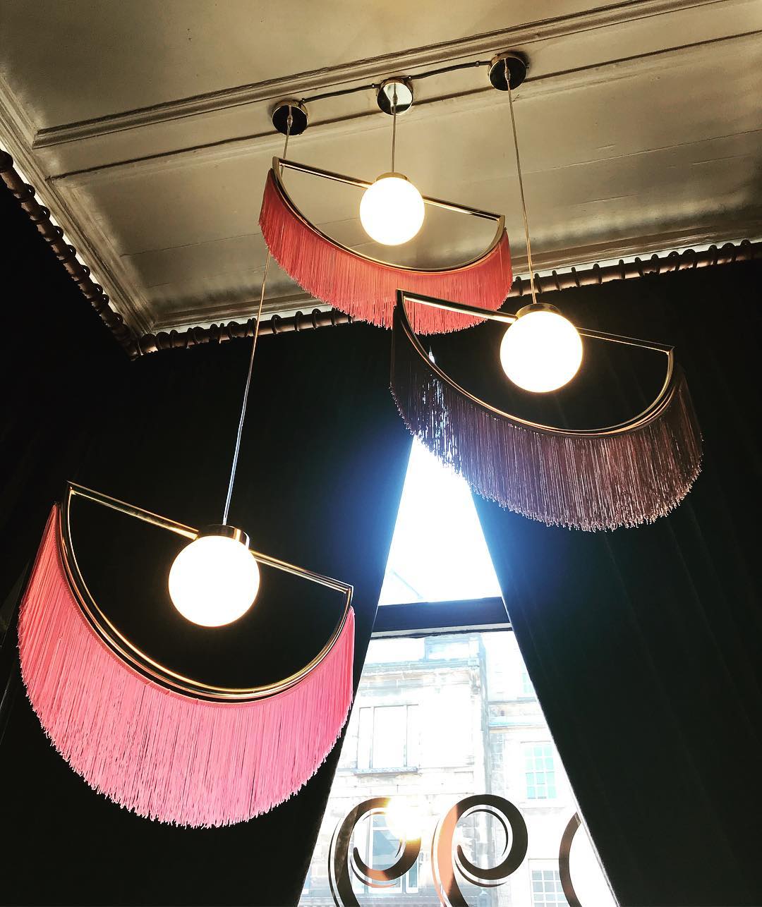 modern-bohemian-tassel-fringe-pendant-light-with-glass-globe-and-gold-metal-frame