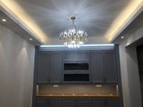 modern-antique-brass-starburst-chandelier-with-clear-crystal-glass-rods