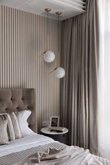 modern-brass-and-opal-glass-globe-pendant-light-minimalist-baton-design-hanging-lamp
