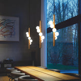 Scandinavian Vertical Wood Column Pendant Light with White Glass Orbs for Modern Home Decor