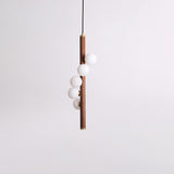 Scandinavian Vertical Wood Column Pendant Light with White Glass Orbs for Modern Home Decor