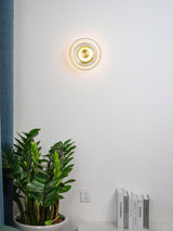 Solara Minimalist Circular LED Wall Sconce with Glass Shade for Bedroom and Hallway