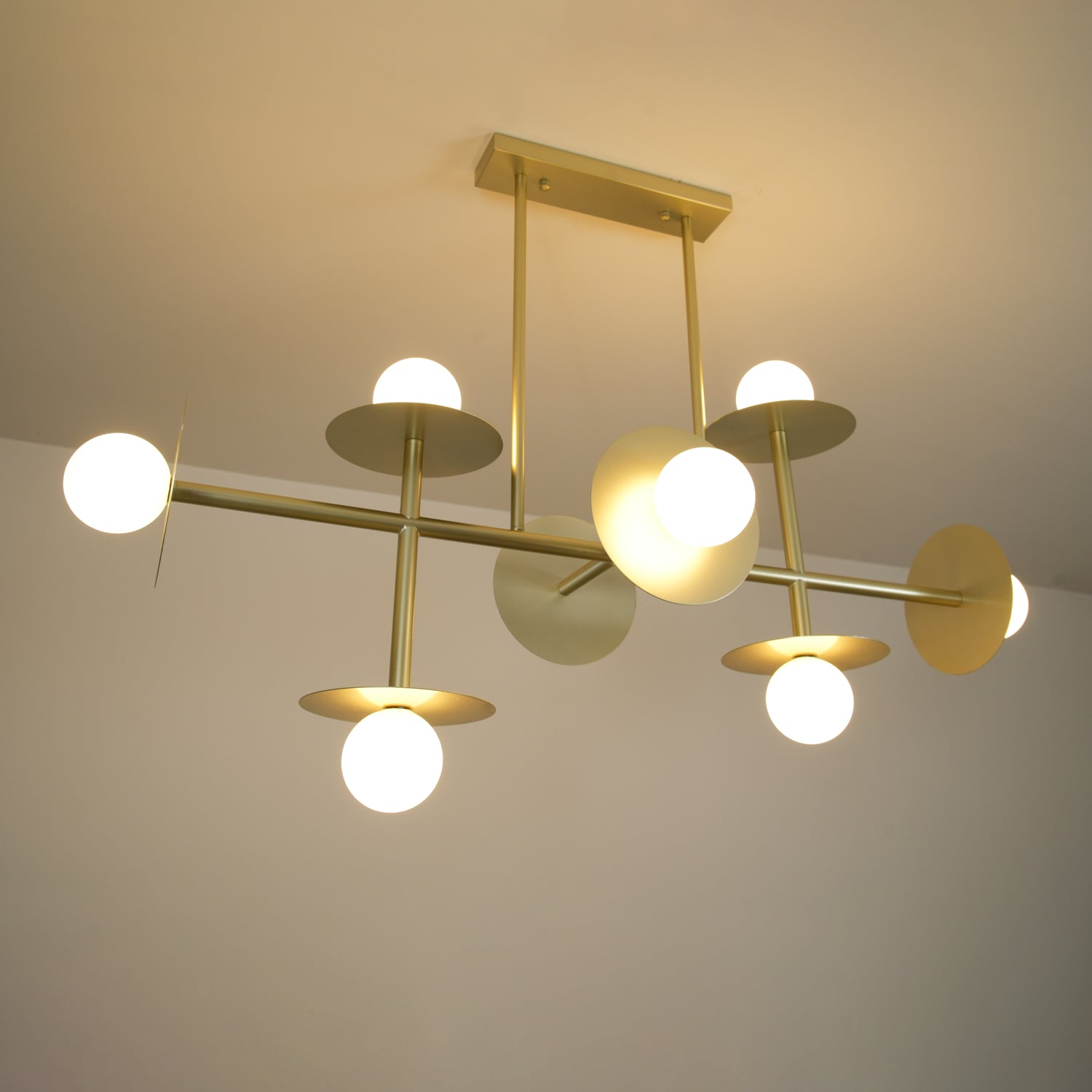Strada Modern Starburst Chandelier with White Glass Globes and Metal Frame