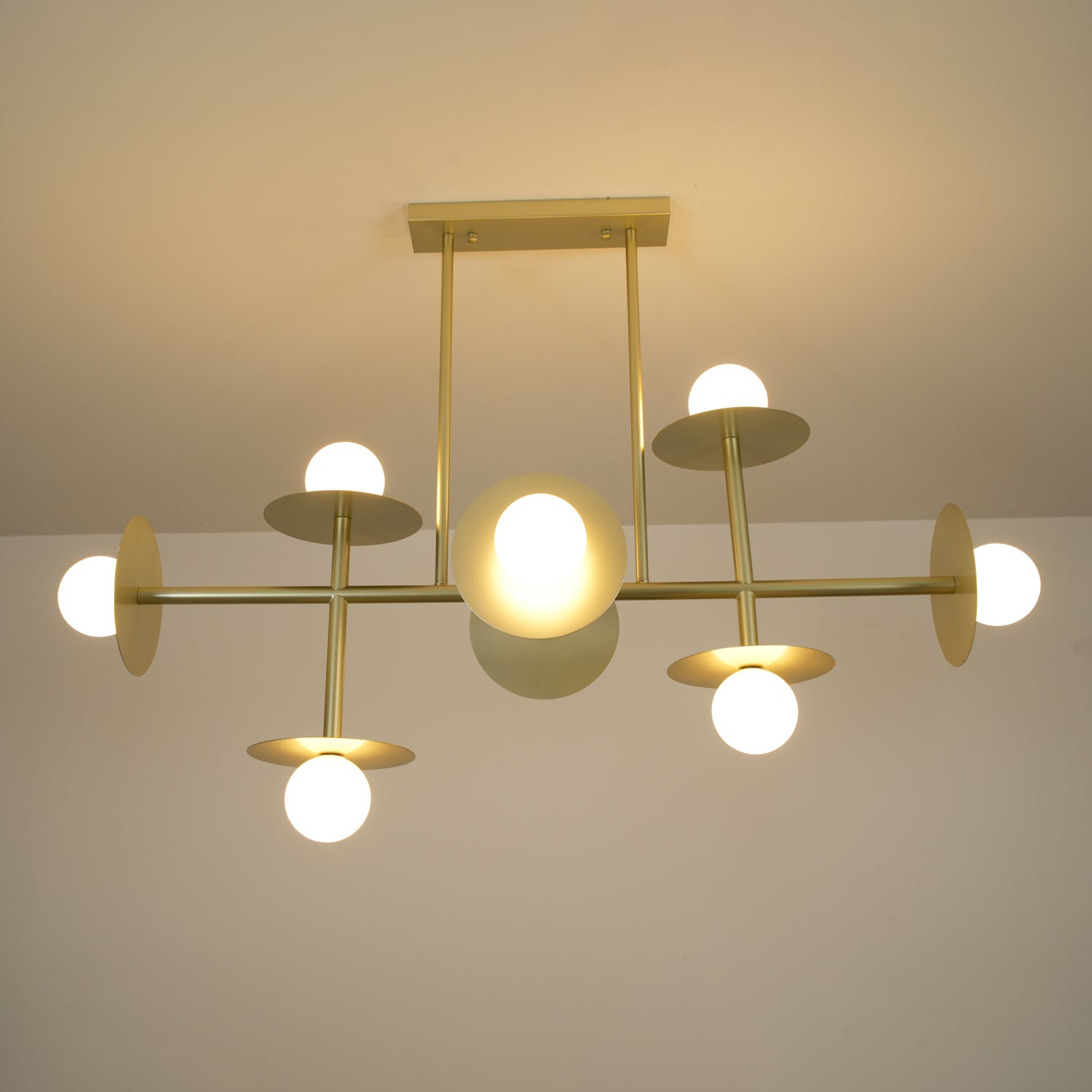 Strada Modern Starburst Chandelier with White Glass Globes and Metal Frame