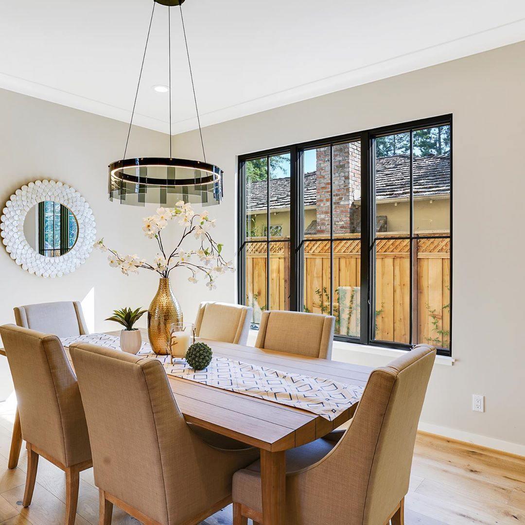 Stratos Modern LED Glass Ceiling Chandelier with Curved Panes for Luxury Dining Spaces