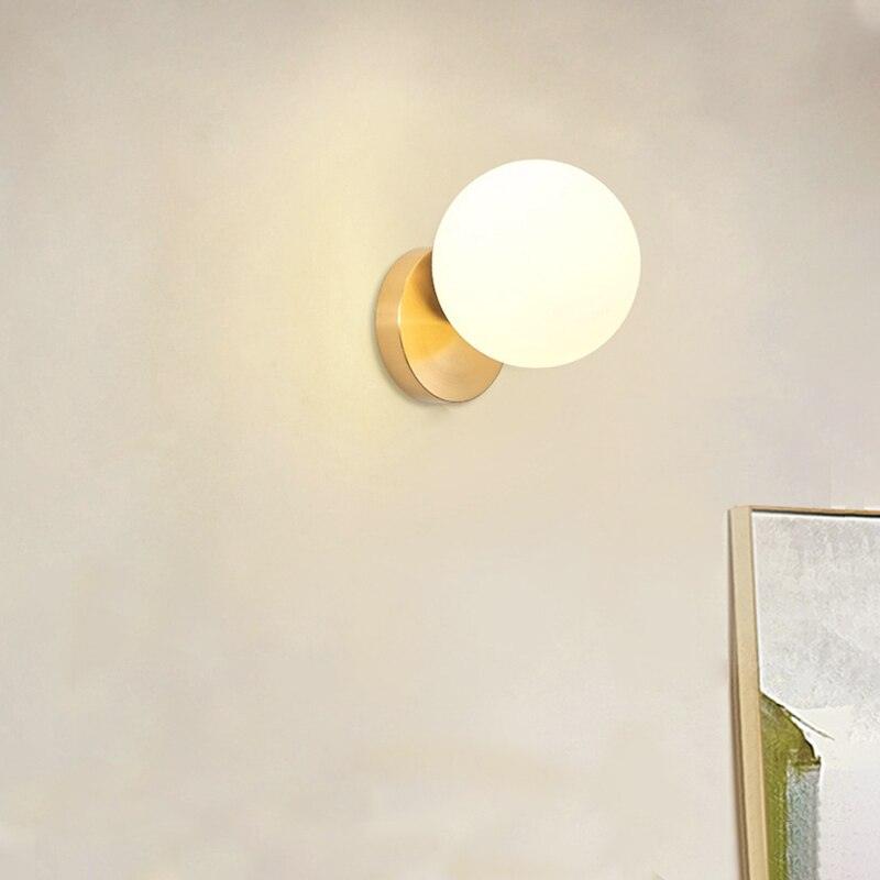 Tip of the Tongue Modern Glass Globe Wall Sconce Gold Finish Indoor Sconce Set of 2