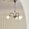 Vintage Black Candelabrum Chandelier with Floral Glass Shades and Brass Accents