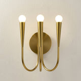 Vintage Curved Swoop Arm Wall Sconce with Clear Glass Globe Shade and Metal Finish