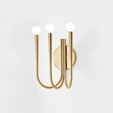 Vintage Curved Swoop Arm Wall Sconce with Clear Glass Globe Shade and Metal Finish
