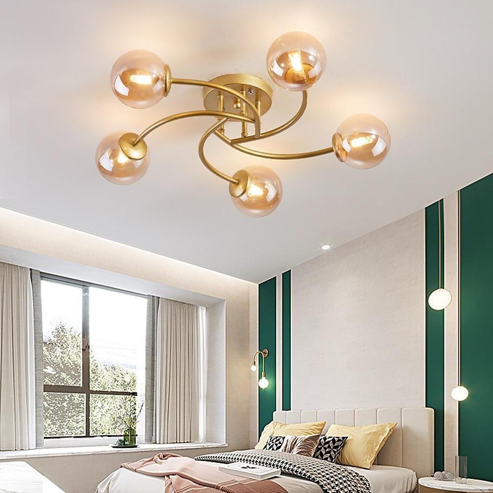 Modern Swirled Metal Flush Mount Light with Elegant Glass Globes for Ambient Bedroom Lighting